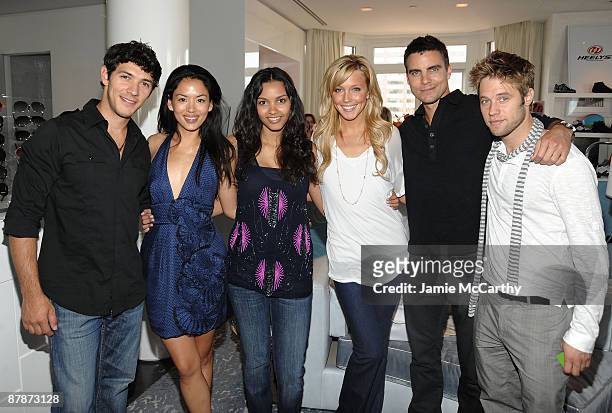 Actors Michael Rady, Stephanie Jacobsen, Jessica Lucas, Katie Cassidy, Colin Egglesfield and Shaun Sipos pose at the Lia Sophia Upfront Suite at The...