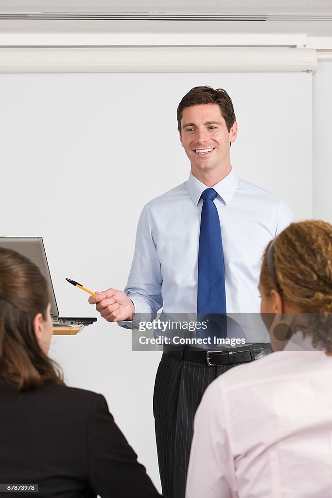 A lecturer teaching business students