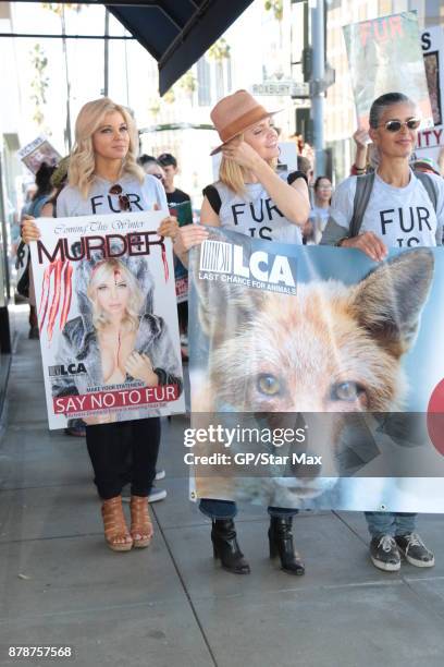 Donna D'Errico and actress Mena Suvari are seen on November 24, 2017 at The Fur Free Friday Peaceful Protest March in Los Angeles, CA.