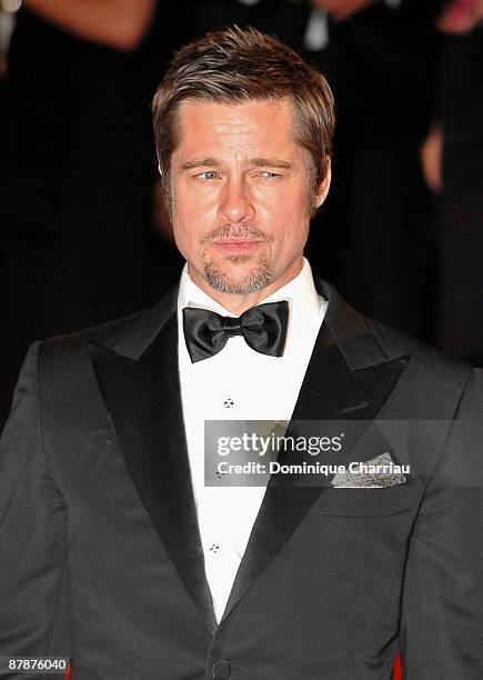 Actor Brad Pitt leaves the 'Inglourious Basterds' Premiere at the Grand Theatre Lumiere during the 62nd Annual Cannes Film Festival on May 20, 2009...