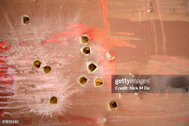 violence - bullet hole in wood stock pictures, royalty-free photos & images