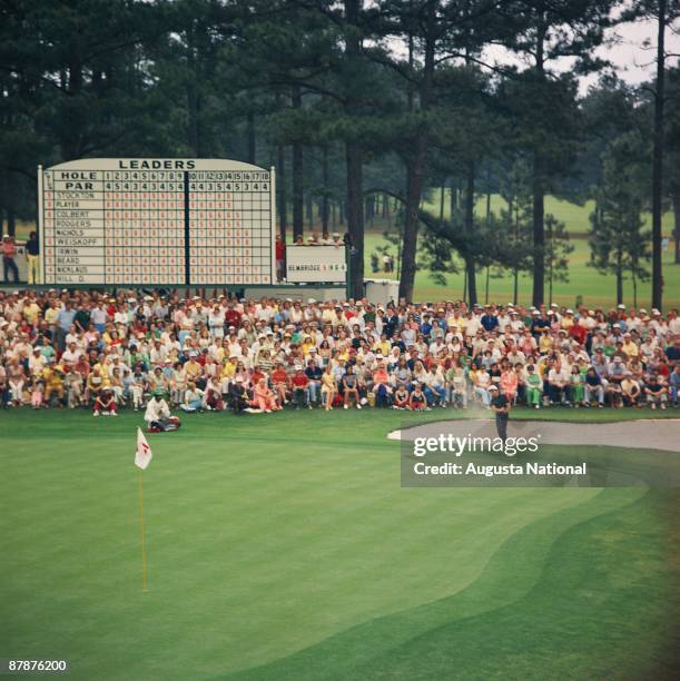 Gary Player pitches out of a bunker on the 15th hole during the 1974 Masters Tournament at Augusta National Golf Club in April 1974 in Augusta,...