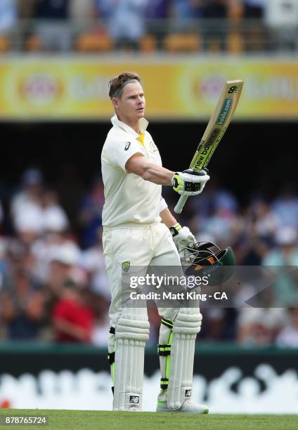 Steve Smith of Australia celebrates and acknowledges the crowd after scoring a century during day three of the First Test Match of the 2017/18 Ashes...