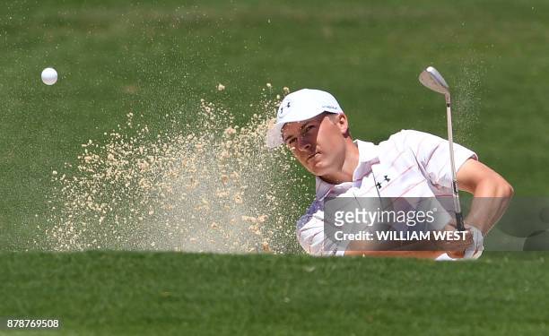 Jordan Spieth of the US hits out of a bunker during the third round of the Australian Open played at the Australian Golf Club course in Sydney on...