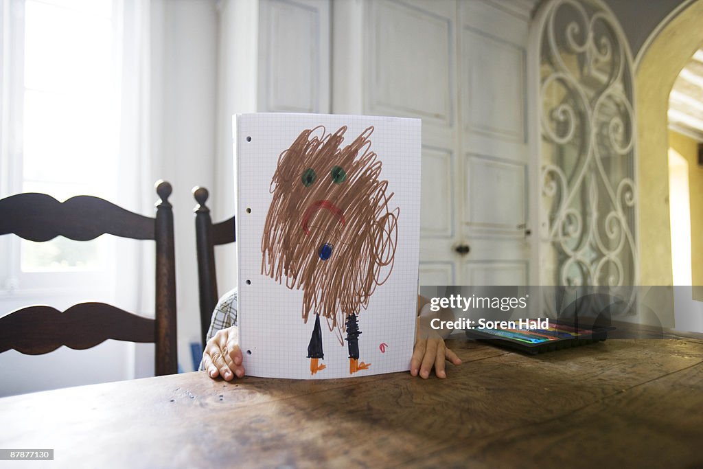 Boy with drawing