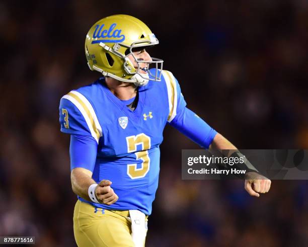 Josh Rosen of the UCLA Bruins celebrates his touchdown pass for a 7-3 lead over the California Golden Bears during the first quarter at Rose Bowl on...