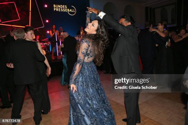 Christine Neubauer and her boyfriend Jose Campos dance during the 66th 'Bundespresseball' at Hotel Adlon on November 24, 2017 in Berlin, Germany.