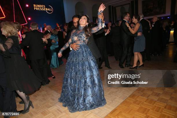 Christine Neubauer and her boyfriend Jose Campos dance during the 66th 'Bundespresseball' at Hotel Adlon on November 24, 2017 in Berlin, Germany.