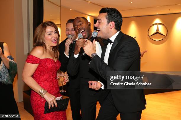 Pia Castro, wife of Cem Oezdemir sings with Giovanni Zarrella and his band "Vintage Vegas" during the 66th 'Bundespresseball' at Hotel Adlon on...