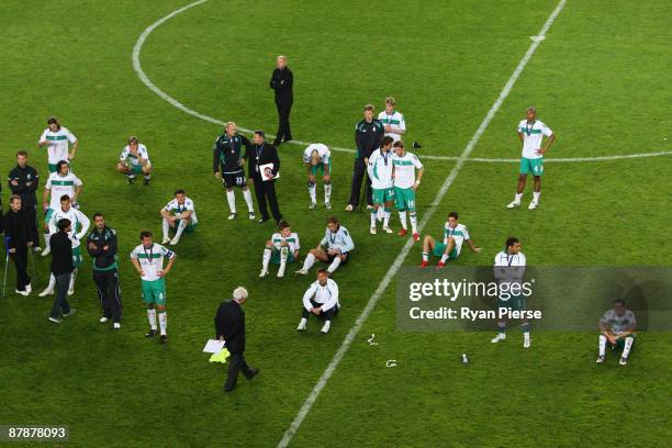 The Werder Bremen look on dejectedly following their team's defeat after extra time at the end of the UEFA Cup Final between Shakhtar Donetsk and...