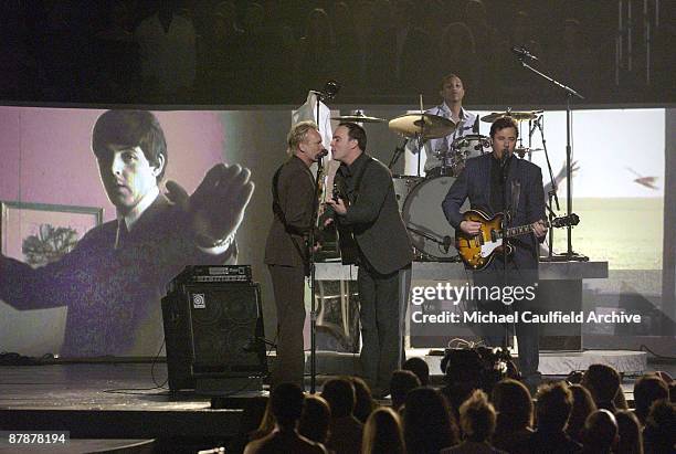 Sting, Dave Matthews, Vince Gill and Pharrell Williams peform the Beatles 40th Anniversary performance on the Ed Sullivan Show of "I Saw Her Standing...