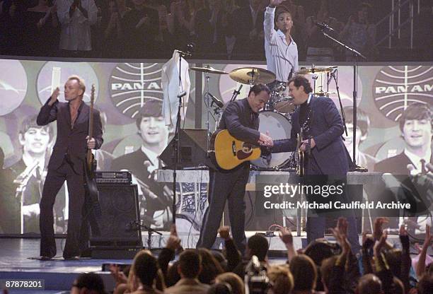Sting, Dave Matthews, Vince Gill and Pharrell Williams peform the Beatles 40th Anniversary performance on the Ed Sullivan Show of "I Saw Her Standing...
