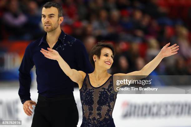 Meagan Duhamel and Eric Radford of Canada react after competing in the Pairs Short Program during day one of 2017 Bridgestone Skate America at Herb...