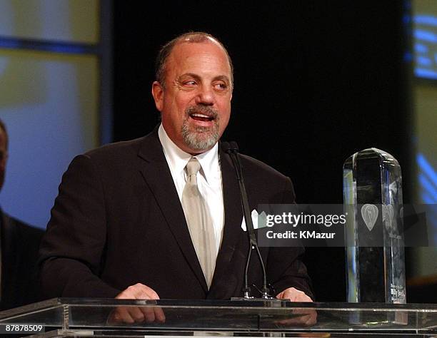 Billy Joel accepts the Person of the Year award from MusicCares.