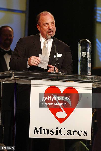 Billy Joel accepts the Person of the Year award from MusicCares.
