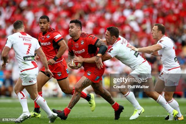 Andrew Fifita of Tonga is tackled during the 2017 Rugby League World Cup Semi Final match between Tonga and England at Mt Smart Stadium on November...