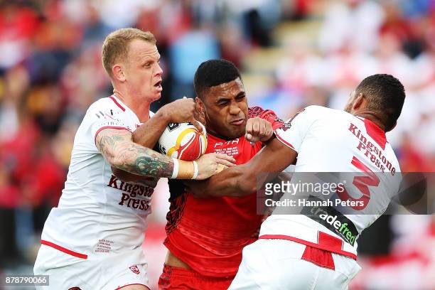 Michael Jennings of Tonga charges forward during the 2017 Rugby League World Cup Semi Final match between Tonga and England at Mt Smart Stadium on...