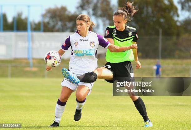 Danielle Brogan of Perth and Amy Sayer of Canberra contest possession during the round five W-League match between Canberra United and Perth Glory at...