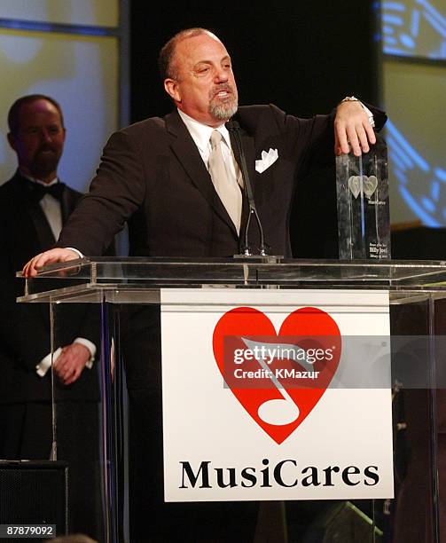 Billy Joel accepts the Person of the Year award from MusicCares.