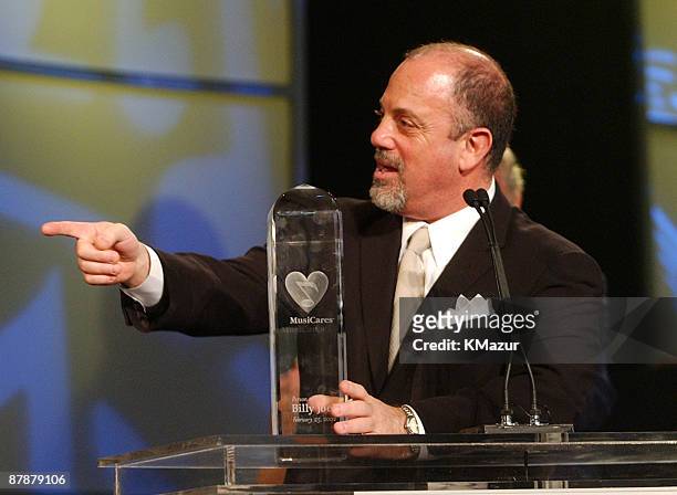 Billy Joel accepts the Person of the Year award from MusicCares.