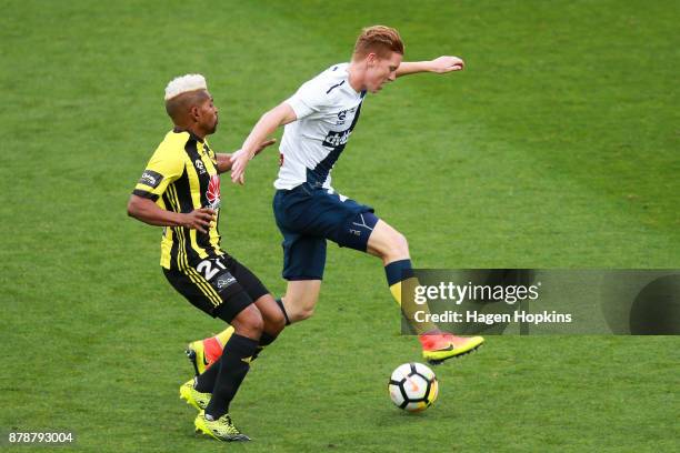 Kye Rowles of the Mariners evades Roy Krishna of the Phoenix during the round eight A-League match between the Wellington Phoenix and the Central...