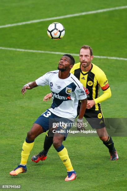 Andrew Durante of the Phoenix defends against Kwabena Appiah-Kubi of the Mariners during the round eight A-League match between the Wellington...