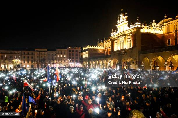 People protest at the Main Square against government plans for sweeping changes to Polands judicial system. Krakow, Poland on 24 November, 2017.