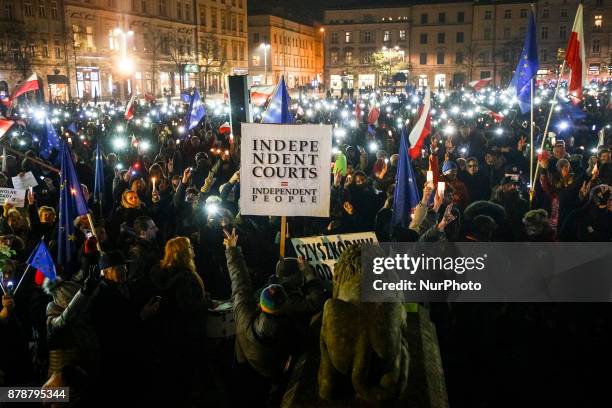 People protest at the Main Square against government plans for sweeping changes to Polands judicial system. Krakow, Poland on 24 November, 2017.