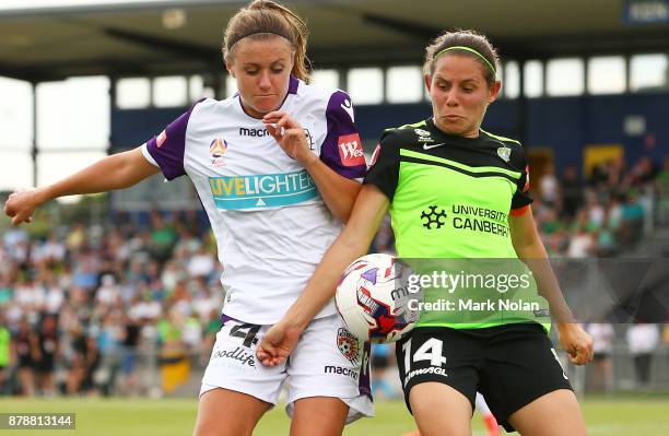 Natasha Rigby of Perth and Ashleigh Sykes of Canberra contest possession during the round five W-League match between Canberra United and Perth Glory...