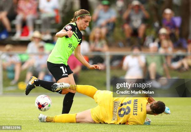 Melissa Maizels of Perth makes a save on an attacking raid by Ashleigh Sykes of Canberra during the round five W-League match between Canberra United...