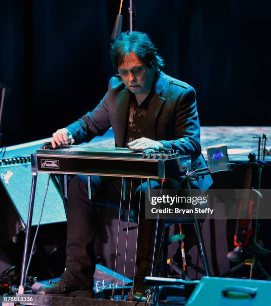 Recording artist John McFee of the Doobie Brothers performs with Timothy B. Schmit as he kicks off his tour at The Orleans Showroom at The Orleans...