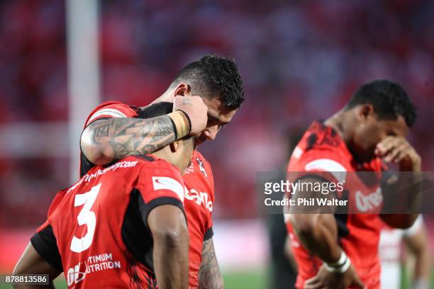 Michael Jennings and Andrew Fifita of Tonga console each other following the 2017 Rugby League World Cup Semi Final match between Tonga and England...