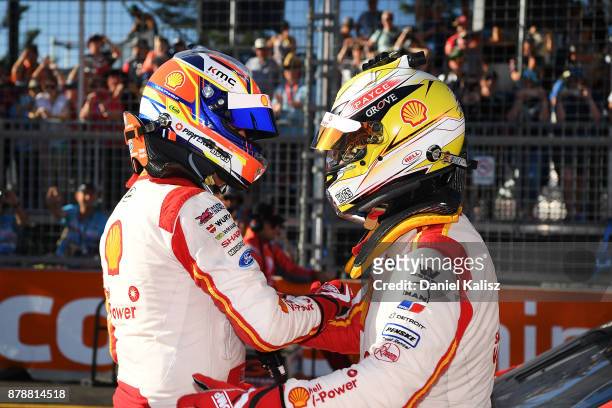 Fabian Coulthard driver of the Shell V-Power Racing Team Ford Falcon FGX congratulates Scott McLaughlin driver of the Shell V-Power Racing Team Ford...