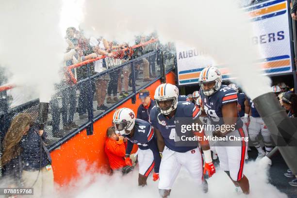 Members of the Auburn Tigers run on to the field prior to their game against the Louisiana Monroe Warhawks at Jordan-Hare Stadium on November 18,...