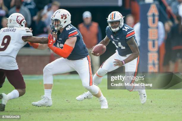 Quarterback Malik Willis of the Auburn Tigers looks to run the ball downfield during their game against the Louisiana Monroe Warhawks at Jordan-Hare...