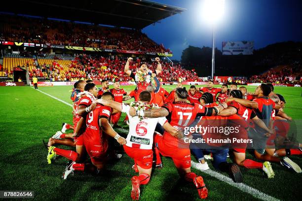 Jason Taumalolo of Tonga leads the Sipi Tau for the crowd after losing the 2017 Rugby League World Cup Semi Final match between Tonga and England at...