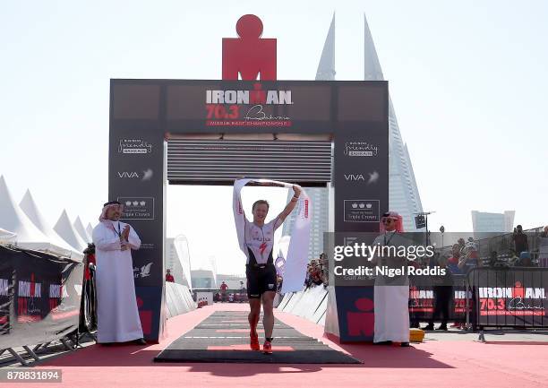 Kristian Blummenfelt of Norway celebrates winning Ironman 70.3 Middle East Championship Bahrain on November 25, 2017 in Bahrain, Bahrain.