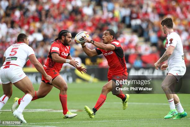 Mafoa'aeata Hingano of Tonga passes the ball during the 2017 Rugby League World Cup Semi Final match between Tonga and England at Mt Smart Stadium on...