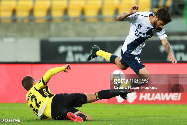 Andrew Durante of the Phoenix tackles Daniel De Silva of the Mariners during the round eight A-League match between the Wellington Phoenix and the...