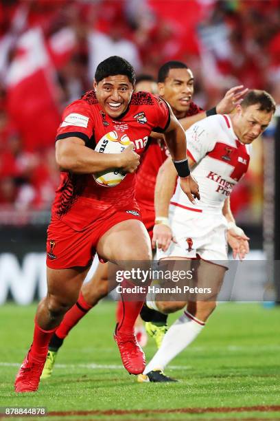 Jason Taumalolo of Tonga makes a break of Tonga set up a try during the 2017 Rugby League World Cup Semi Final match between Tonga and England at Mt...