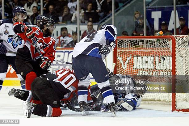 Gabriel Dumont of the Drummondville Voltigeurs scores the game-winning goal on Maxim Gougeon of the Rimouski Oceanic during the 2009 Mastercard...
