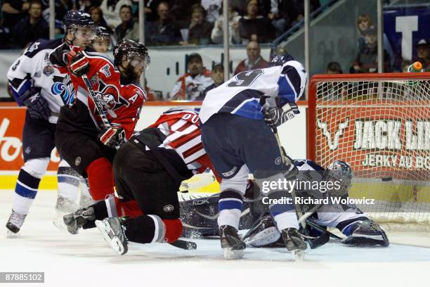 Gabriel Dumont of the Drummondville Voltigeurs scores the game-winning goal against Maxim Gougeon of the Rimouski Oceanic during the 2009 Mastercard...