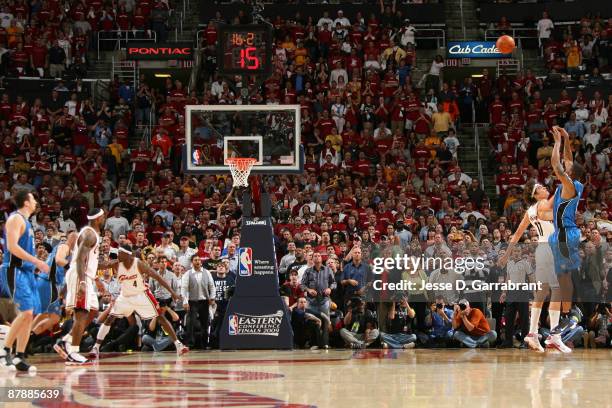Rashard Lewis of the Orlando Magic shoots the game-winning shot against Anderson Varejao of the Cleveland Cavaliers in Game One of the Eastern...