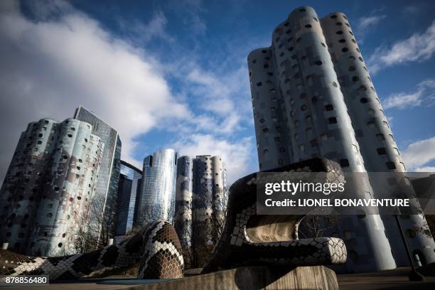 Large snake shaped sculpture designed by Laurence Rieti is pictured in the playground area of The Tours Aillaud, also known as Tours Nuages, on...