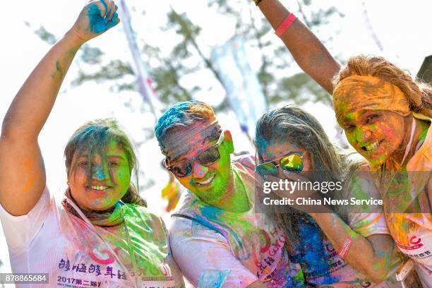 About a thousand participants from 68 countries attend the color run during the Second Hainan International Tourism Island Youth Festival on November...