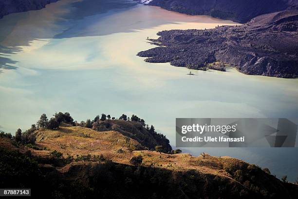 View of lake Segara Anak is seen at Mount Rinjani, also known as Gunung Rinjani, on May 19, 2009 in Lombok, West Nusa Tenggara Province, Indonesia....