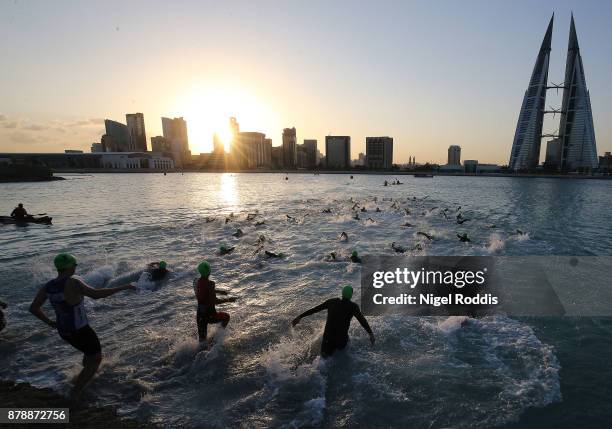 Athletes compete in the swim section of the Ironman 70.3 Middle East Championship Bahrain on November 25, 2017 in Bahrain, Bahrain.