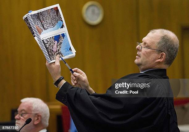 Crown counsel Cameron Mander cross examines during the continuation of David Bain's retrial at Christchurch High Court on May 21, 2009 in...