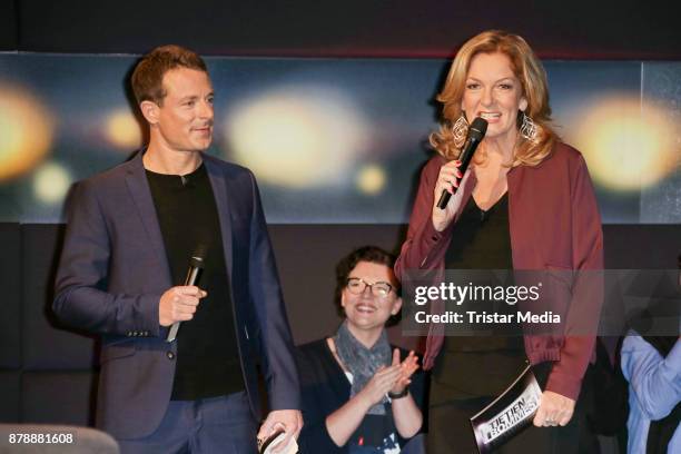 Alexander Bommes and Bettina Tietjen during the 'Tietjen und Bommes' photo call on November 24, 2017 in Hanover, Germany.