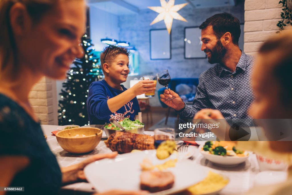 Family On Christmas Dinner At Home